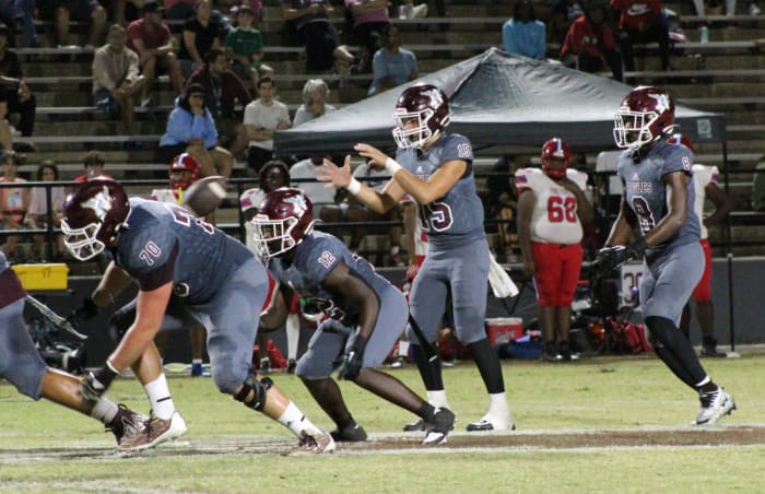 Kane Lafortune takes the snap